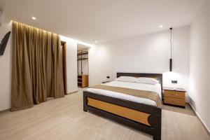 Postel nebo postele na pokoji v ubytování Hotel EN AD