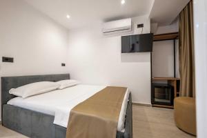 Postel nebo postele na pokoji v ubytování Hotel EN AD