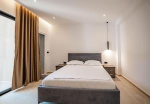 Postel nebo postele na pokoji v ubytování Hotel EN AD