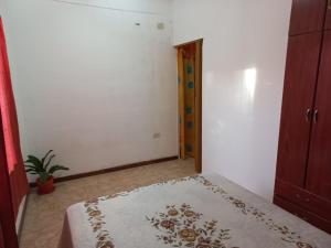 Postel nebo postele na pokoji v ubytování Don Lalo + 1 fotografie