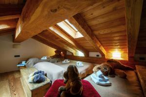 Postel nebo postele na pokoji v ubytování Chalet Maison Felix