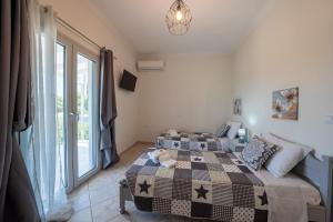 Ένα ή περισσότερα κρεβάτια σε δωμάτιο στο Tereza's charming house