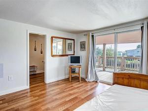 Postel nebo postele na pokoji v ubytování Coral on the Canal + 6 fotografií