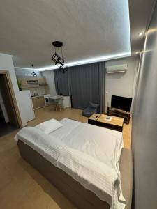 Postel nebo postele na pokoji v ubytování Cozystay axd