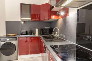 Kuchyň nebo kuchyňský kout v ubytování Serignan Village Appartement + 15 fotografií