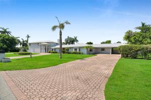 O grădină în afara Luxury Waterfront-Pool Home, Slide, Hot Tub, Gulf Access