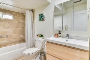 a bathroom with a white toilet and a sink at Secret Garden Healing Retreat! Beavertin Nike Area in Beaverton +17 photos