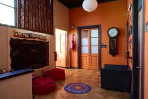 Uma TV ou centro de entretenimento em Hostal Providencia