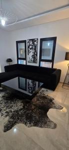 Χώρος καθιστικού στο Le luxe MENZAH5