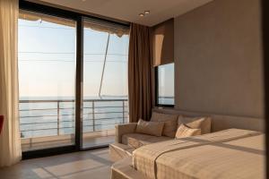 Katil atau katil-katil dalam bilik di Hotel Ble Ble Vlore
