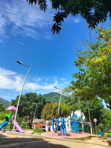 a park with a playground with a slide at Habitación privada in Santa Marta