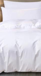 an unmade bed with white sheets and pillows at Aberdeen Richview Luxury Apartments Full 1 Bedroom Apartment Sleeps 3 A200 in Freetown