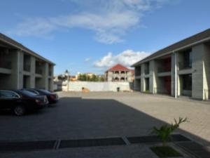 a parking lot with cars parked in front of a building at Aberdeen Richview Luxury Apartments Full 1 Bedroom Apartment Sleeps 3 A200 in Freetown