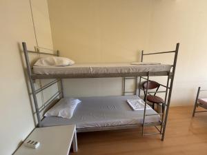 Postel nebo postele na pokoji v ubytování Garden Hostel