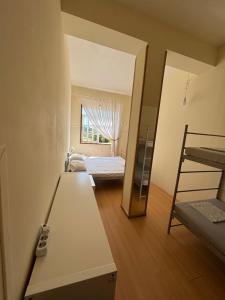 Postel nebo postele na pokoji v ubytování Garden Hostel