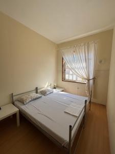 Postel nebo postele na pokoji v ubytování Garden Hostel