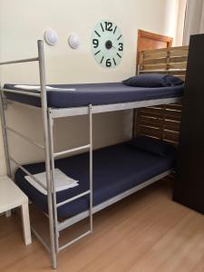 Postel nebo postele na pokoji v ubytování Garden Hostel