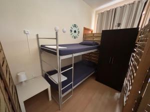 Postel nebo postele na pokoji v ubytování Garden Hostel