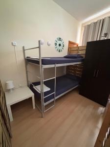 Postel nebo postele na pokoji v ubytování Garden Hostel