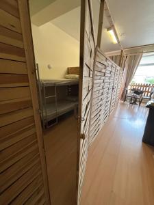 Postel nebo postele na pokoji v ubytování Garden Hostel