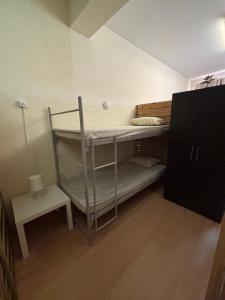 Postel nebo postele na pokoji v ubytování Garden Hostel
