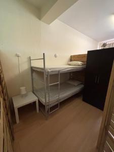 Postel nebo postele na pokoji v ubytování Garden Hostel