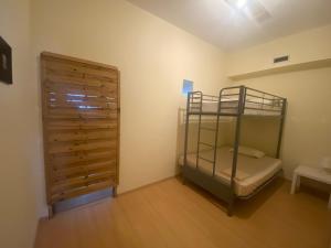 Postel nebo postele na pokoji v ubytování Garden Hostel