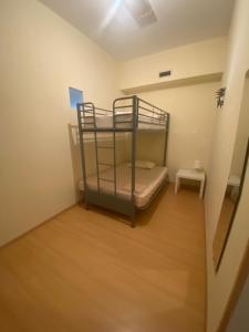 Postel nebo postele na pokoji v ubytování Garden Hostel