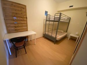 Postel nebo postele na pokoji v ubytování Garden Hostel