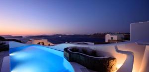 a night view of a swimming pool with the sky at Exquisite Santorini Villa Villa Luna 3 Bedrooms Breathtaking Sea Views And Private Pool Akrotiri in Akrotiri