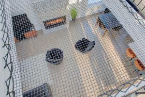 an overhead view of a cage with two people in it at La Villa Bali in Pont-Rouge