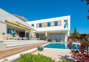 Kolam renang di atau dekat dengan Ultra Luxurious Hvar Villa 5 Bedrooms Villa Celestia Private Heated Infinity Pool & Stunning Sea Views Sveta Nedilja