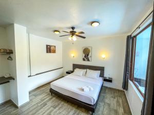 Postel nebo postele na pokoji v ubytování Toucan Platinum Suites Aparthotel