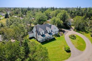an aerial view of a large house with a driveway at The Montgomery in Cavendish