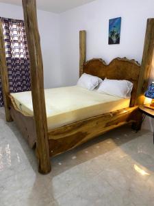 Ένα ή περισσότερα κρεβάτια σε δωμάτιο στο Mount Meru Baraka House