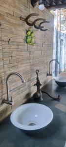 Koupelna v ubytování Área de lazer 3 suítes 50 ps