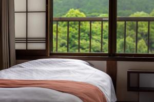 瑞光園-大川 Zuiko Retreat客房内的一张或多张床位