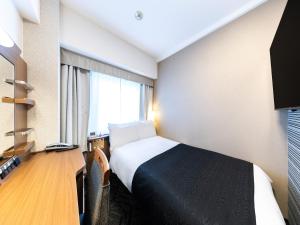Телевизор и/или развлекательный центр в APA Hotel Tennoji Ekimae
