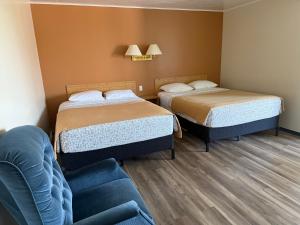 Postel nebo postele na pokoji v ubytování Le Campagnard