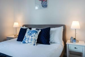 McG Mudgee -Hamptons inspired- with a splash pool客房内的一张或多张床位