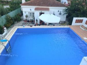 Bazén v ubytování Preciosa y tranquila villa en Valencia con piscina privada nebo v jeho okolí