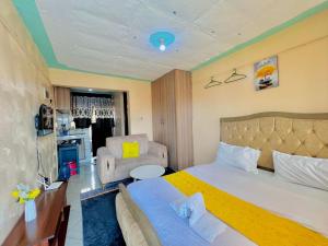 Ένα ή περισσότερα κρεβάτια σε δωμάτιο στο White Arts homes