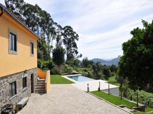 an external view of a house with a swimming pool at Beautiful Ponte De Lima Villa 4 Bedrooms Villa Hermosa Vista Private Pool in Ponte de Lima