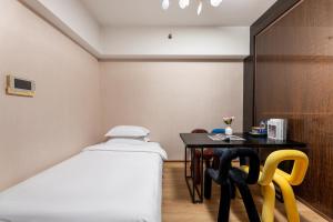 Łóżko lub łóżka w pokoju w obiekcie Manriver Executive Apartments