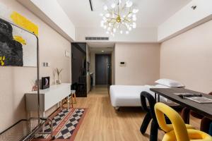 Łóżko lub łóżka w pokoju w obiekcie Manriver Executive Apartments