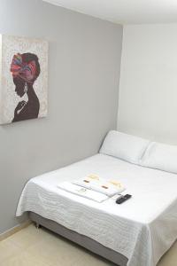 Letto o letti in una camera di Hotel Daniels