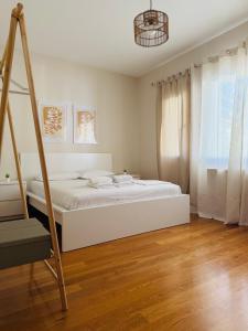 Postel nebo postele na pokoji v ubytování Villa in Elassona-Βίλα στην Ελασσόνα