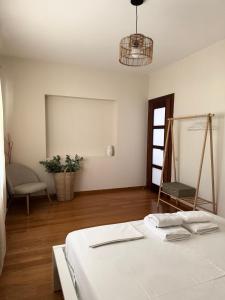 Postel nebo postele na pokoji v ubytování Villa in Elassona-Βίλα στην Ελασσόνα