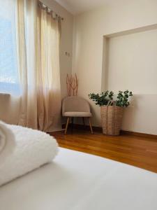 Postel nebo postele na pokoji v ubytování Villa in Elassona-Βίλα στην Ελασσόνα