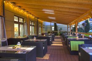 Reštaurácia alebo iné gastronomické zariadenie v ubytovaní Hotel Verde Montana Wellness & Spa